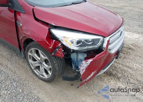 2019 Ford Escape Titanium z USA, uszkodzony, nr VIN 1FMCU9J97KUC29706